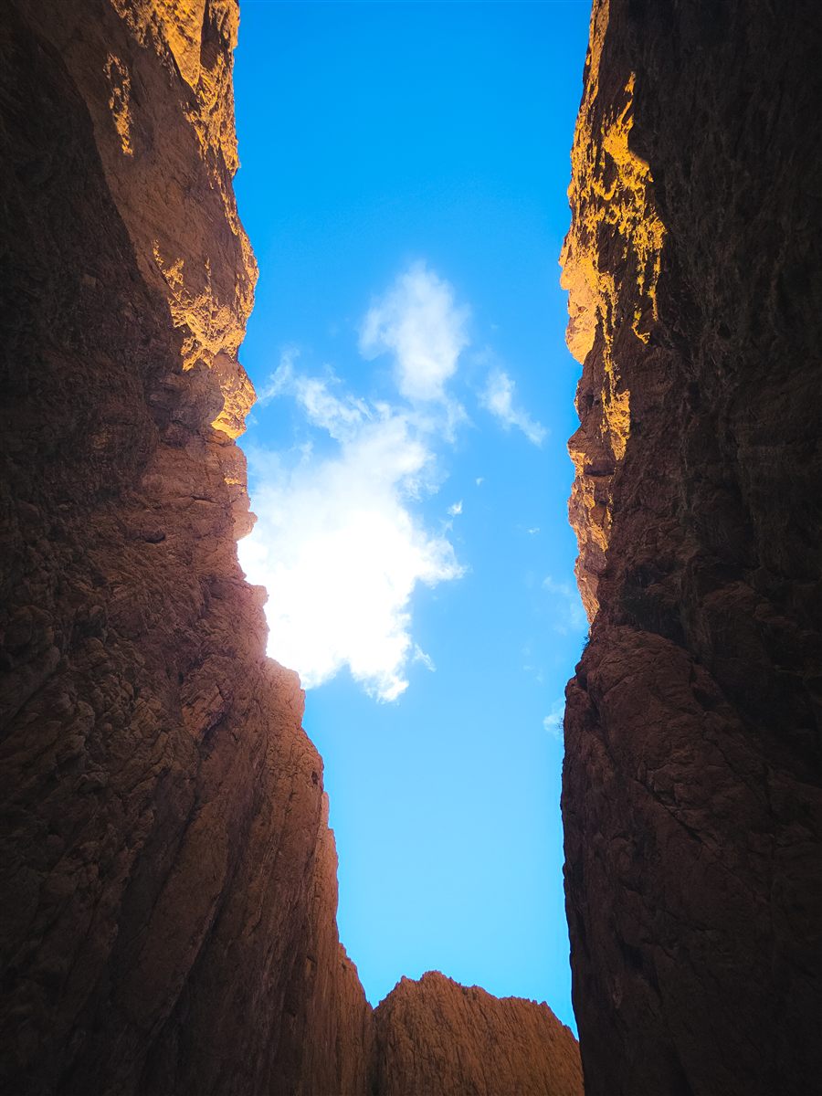Blue sky between canyon walls