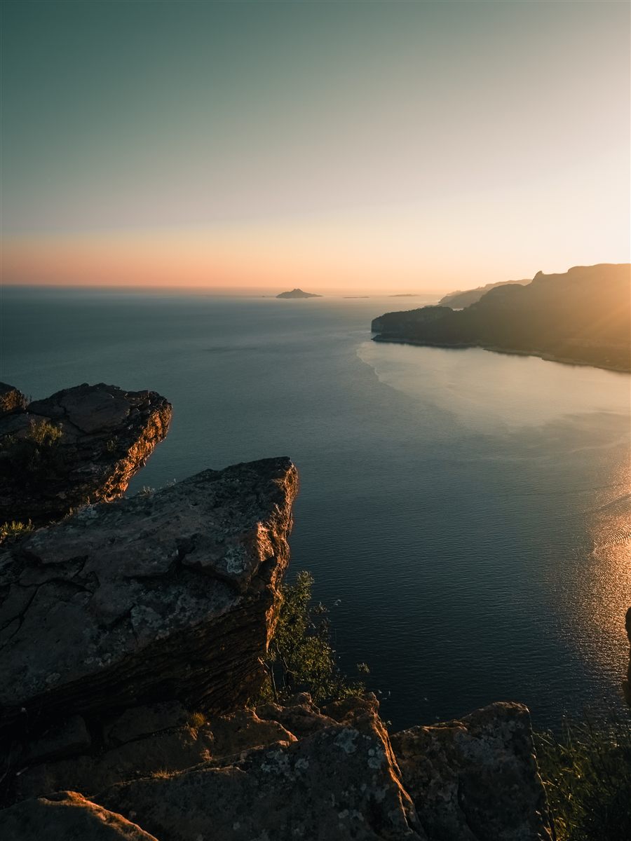 Cliffs over the sea at sunset